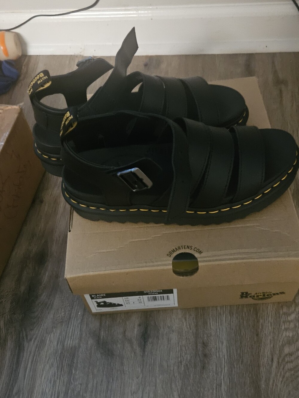 Dr. Martens Black Leather Fisherman Sandals with Yellow Stitching